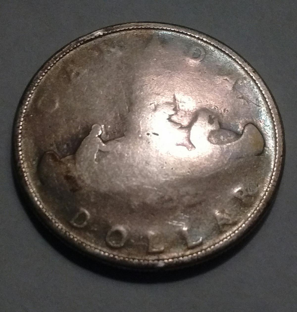 1952-Canada-Silver-Dollar-What-Could-Have-Caused-This?